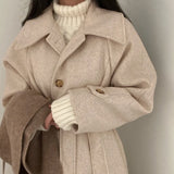 Women's long wool coat, wrap style.