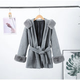 Luxury women's coat with hood.