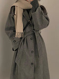 Women's long wool coat, wrap style.