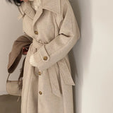 Women's long wool coat, wrap style.