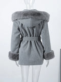Luxury women's coat with hood.