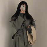 Women's long wool coat, wrap style.
