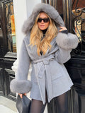 Luxury women's coat with hood.