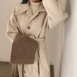 Women's long wool coat, wrap style.