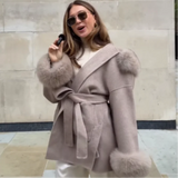 Luxury women's coat with hood.