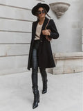 Women's mid-length wool coat.