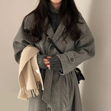 Women's long wool coat, wrap style.