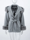 Luxury women's coat with hood.